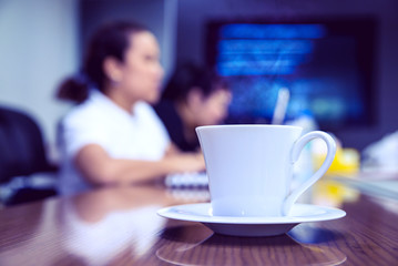 cup coffe start work for day with blue women meeting