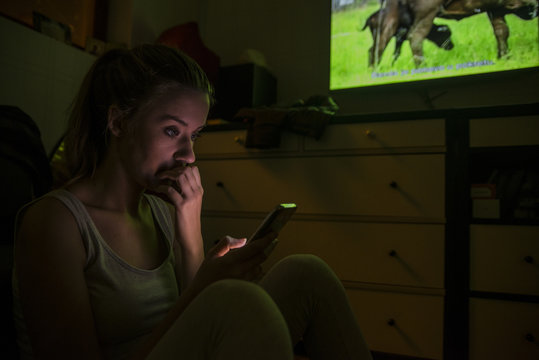 Depressed Girl Holding Her Phone