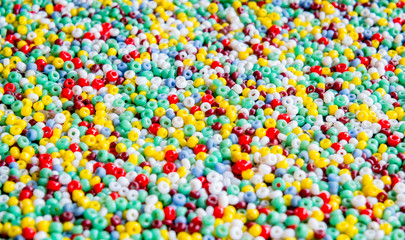 Fototapeta na wymiar Multi colored beads abstract background.
