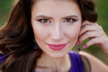 portrait of a beautiful young woman with make-up closeup