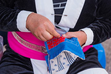 Embroider pattern colored thread.
