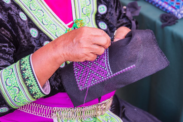 Embroider pattern colored thread.
