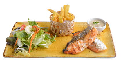 Salmon steak in plate on white background