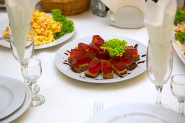 meat appetizer with red marmalade