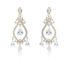 Pair of silver diamond earrings isolated on white