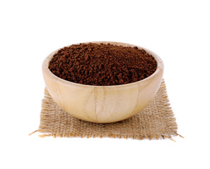 instant coffee in wooden basket on white background
