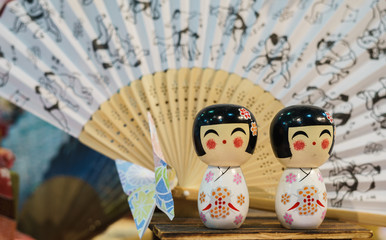 japanese dolls with  folding fan background