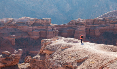 Man with backpack standing at Sharyn Canyon and enjoy the beautiful view  
