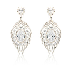 Pair of silver diamond earrings isolated on white