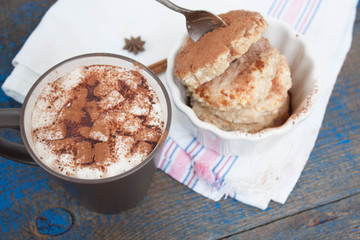 Russian cheese pancakes and cocoa with marshmallow on a wooden background. sweet delicious Russian food
