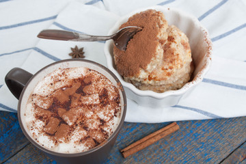 Russian cheese pancakes and cocoa with marshmallow on a wooden background. sweet delicious Russian food