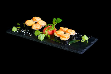 grilled roll on a black background