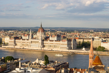 Fototapeta na wymiar Parlament in Budapest with riverside in Hungary