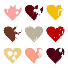 Set with nine grunge icons of hearts with splashes of paint