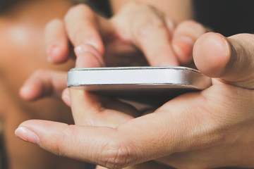 Teenage girl text messaging on her phone