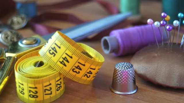 sewing supplies scattered on the table