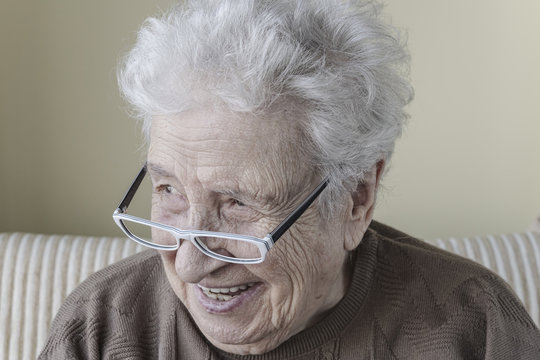 Happy senior woman wearing eyeglasses