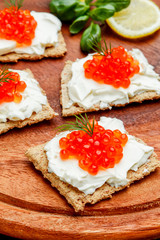 Canapes with red caviar