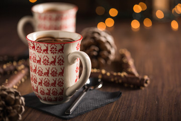 Cup of hot chocolate with Christmas lights
