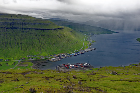 Overlook on a stormy day of fish processing industry in the Faroe Islands