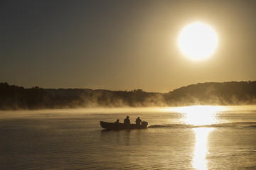 Fishing boat at sunrise