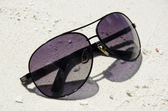 sunglasses on the sand