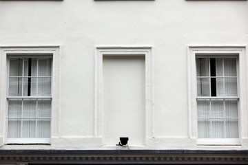 Georgian windows architecture on a wall house, London, UK