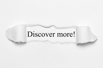 Discover more! on white torn paper