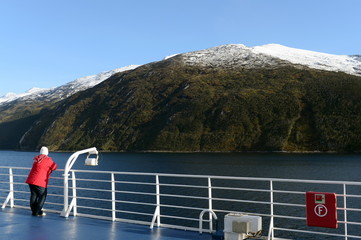 On the deck of a cruise ship in fjord Pia the archipelago of Tierra del Fuego.