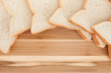 Bread slices on cutting board. Top down view.