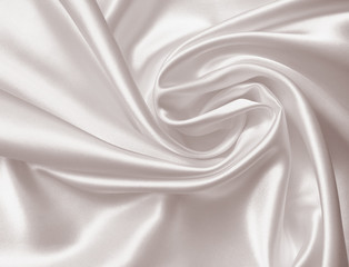 Smooth elegant golden silk or satin texture as background. In Se