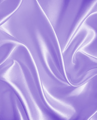Smooth elegant lilac silk or satin texture as background