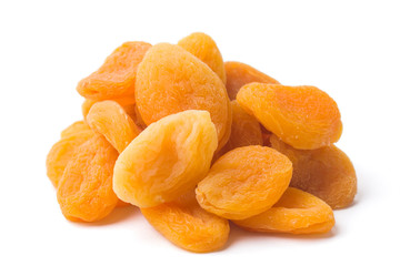 heap of dried apricots on white background, isolated