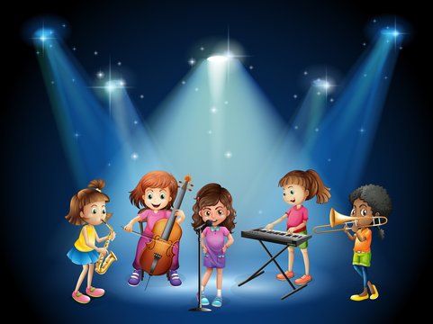 Children playing music in concert