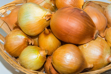 Close-up of bulb onion in a basket