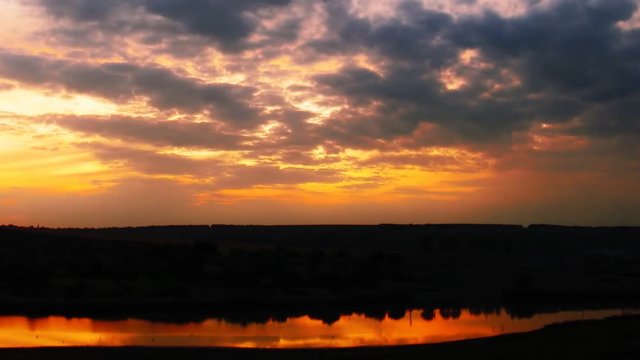 beautiful sunset over lake. timelapse FHD