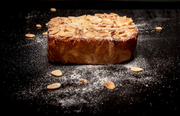 Toast sprinkled with sugar peas  on reflection black background