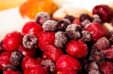 Close up of frozen mixed fruit, berries - cherry, raspberry, bla
