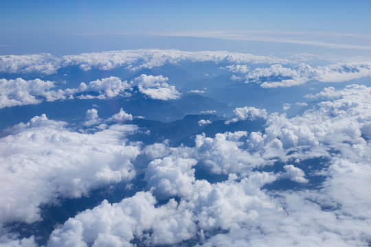 Clouds and sky as seen through window of an aircraft © Cristina Jurca