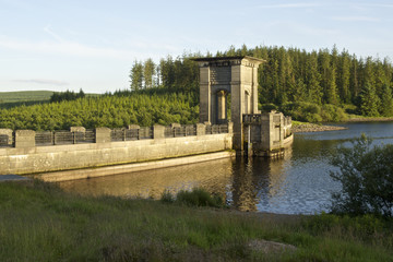 Alwen reservoir, Wales, UK Summers day Medium shot with warm sunlight on the side showing lake and...