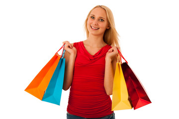 Fototapeta na wymiar Beautiful young woman with shopping bags consumerism isolated ov
