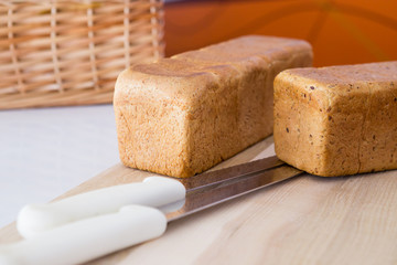 A loaf of bread is on the board