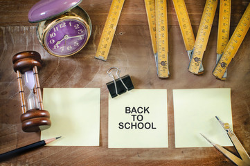 Word of back to school on sticky note, education concept and educational aid idea