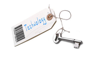 A silver key with a tag attached with a Technology concept written on it.