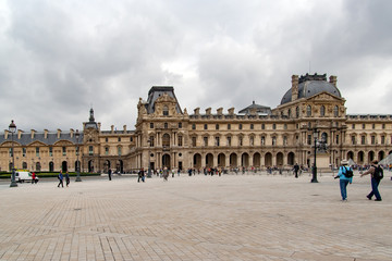 Fototapeta na wymiar PARIS, FRANCE - april 22, 2016: The Louvre palace in the Carrousel Square. Louvre Museum is one of the largest and most visited museums worldwide