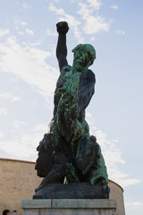 Statue in Budapest, Hungary on blue sky background