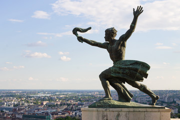 Statue in Budapest, Hungary on blue sky background