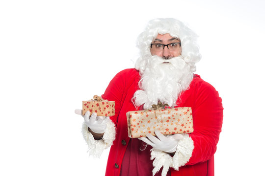  Portrait of happy Santa Claus holding  Christmas gifts
