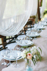 Festive table setting. Wedding decor. Table setting in classic style.