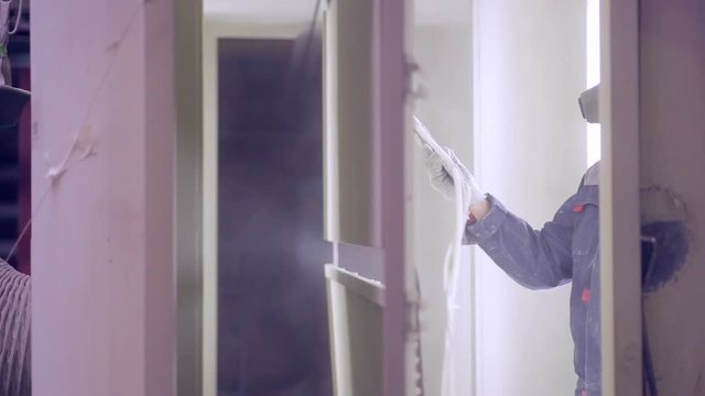 Industrial Spray Painting at painting factory shop. HD.